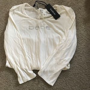 BNWT slinky ivory BEBE lace up top